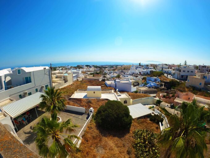 plot in karterados with old hotel for sale