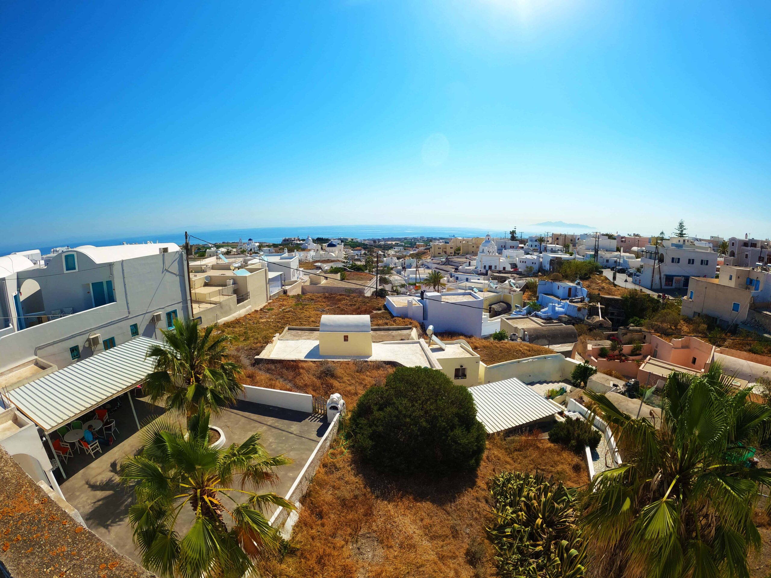 plot in karterados with old hotel for sale